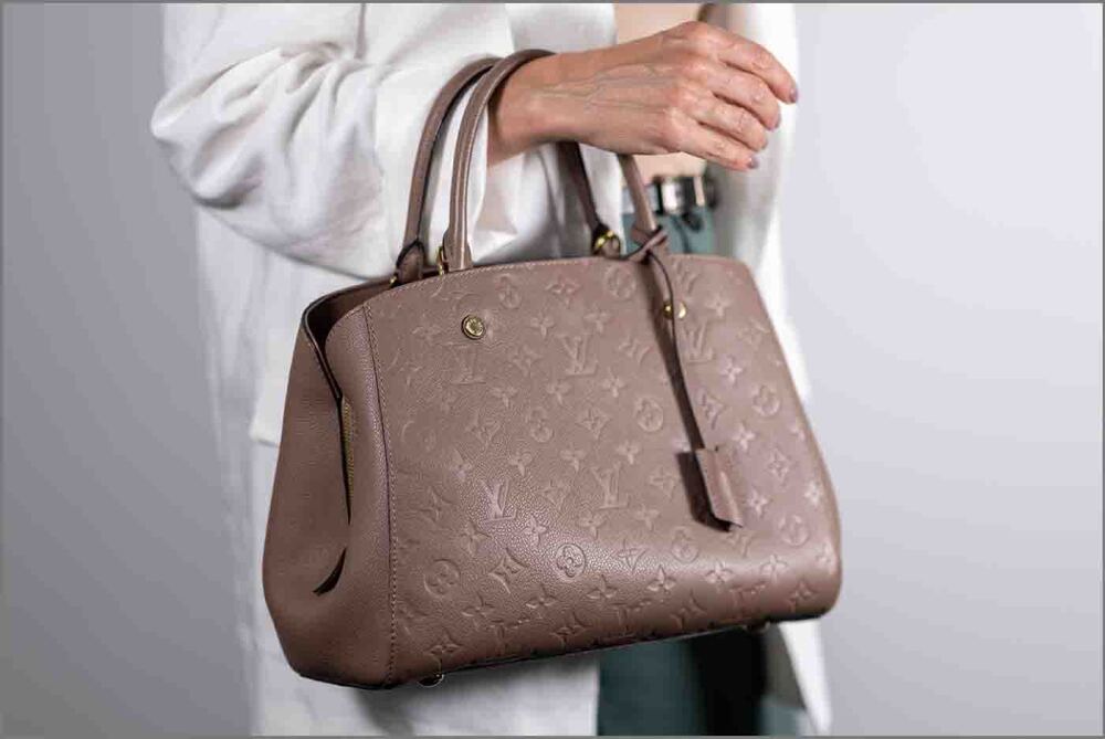 Sold at Auction: Louis Vuitton Monogram Empreinte Montaigne GM