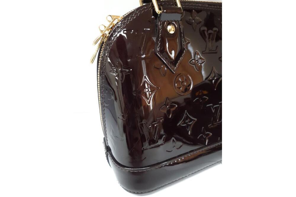 Sold at Auction: Louis Vuitton Monogram Alma PM Bag 1999