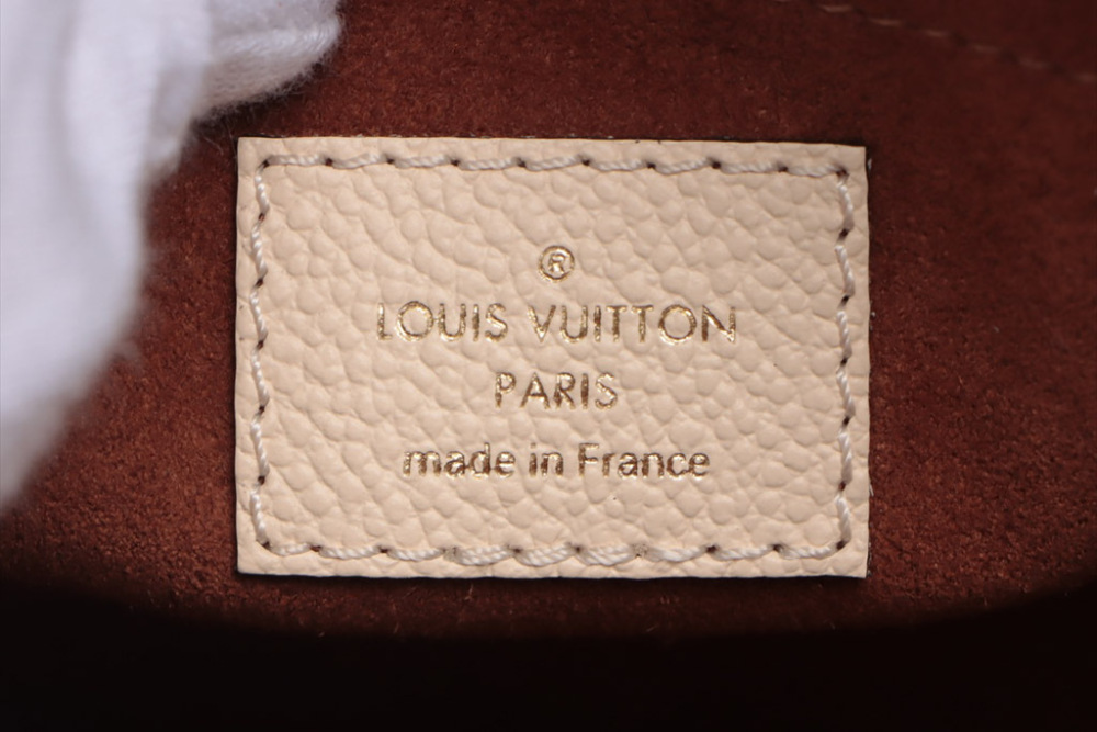 Louis Vuitton  Neo Alma BB in Creme Beige (Empreinte