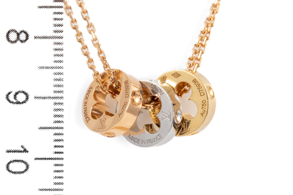 Sold at Auction: Louis Vuitton Empreinte Pendant Necklace 18K