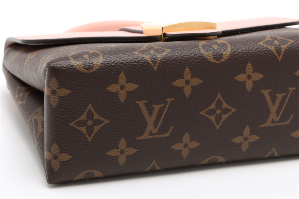 Sold at Auction: Louis Vuitton Brown Monogram Coated Canvas