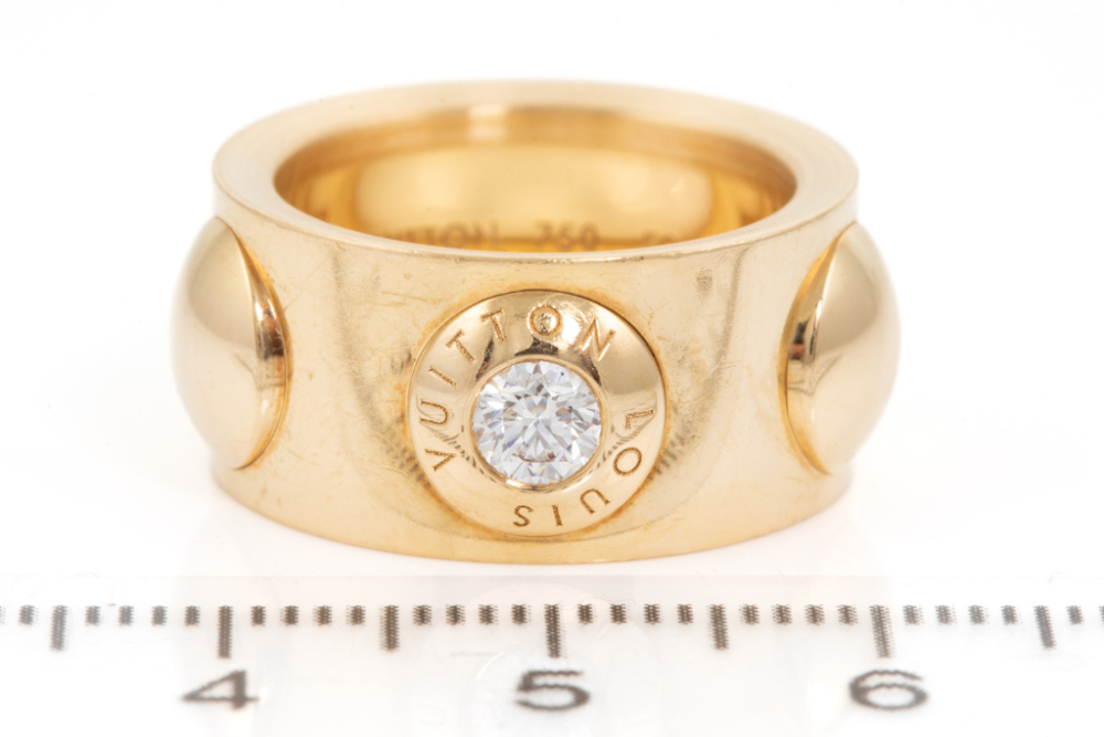 Sold at Auction: Pair of 18ct gold and diamond 'Empreinte' rings, Louis  Vuitton