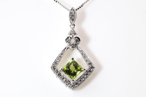 0.71ct Peridot and Diamond Pendant